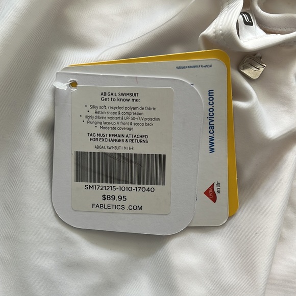 White one piece style swimsuit. - Picture 3 of 5